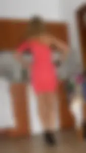 Girl in a Red Dress And Pantyhose in Shoes on High Heels Kitchen Creepshot