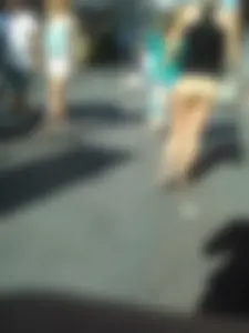 Brunette ass cheeks in short yellow shorts