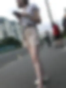 Cute Girl in a Blouse and Shorts With Thin Legs Bus Stop Candid Photo Gallery