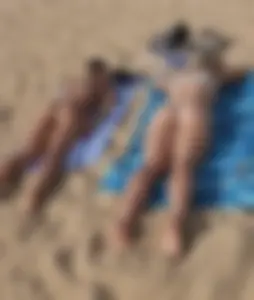 Two plump ass college babes face down ass up sunbathing in thong bikinis