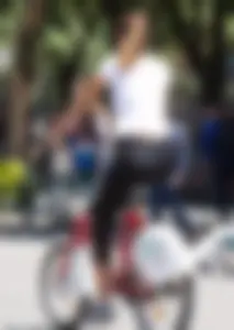 Sexy girl riding a bike in leggings with vtl