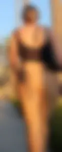 Pair of bootys in leggings walking