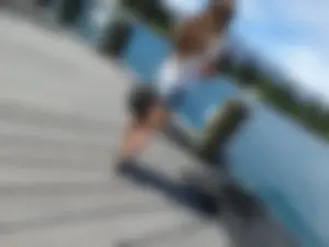 Pretty girl with a camera in little denim shorts