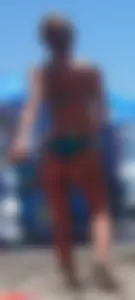 Sexy blonde on the beach in a teal thong bikini with nice ass