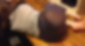 Girl in tights lying on the floor