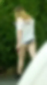 Thick girl in little shorts showing her cheeks