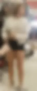 Girls in tight shorts in a shop
