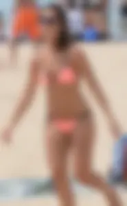 Girl in peach bikini on the beach with a great body and great ass