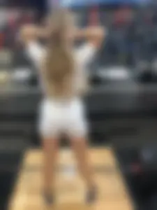 Blonde in Spandex Shorts and a Top Working Out