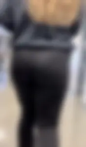 Cute College Girl With Flared Leggings And Glasses