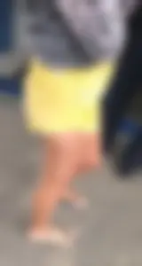Skinny ass eating her yellow shorts