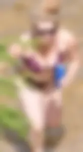Chunky blonde enjoying some drinks in the water in her purple bikini
