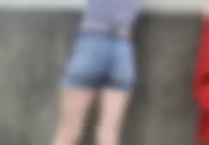 Tight ass in grey jean shorts.