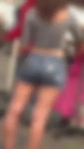 Girl in Denim Mini Shorts and a Top Candid Photos