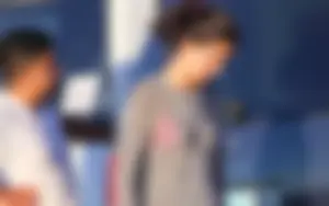 Skinny teen in leggings with vpl in the parking lot