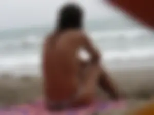 Hot topless girl on the beach in a thong bikini with a nice ass
