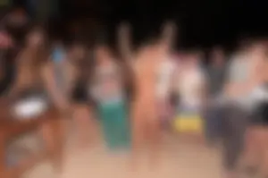 Only one is nude - group photos where only 1 girl is naked, and the rest of the people are dressed
