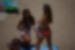 Beach volleyball babe with a nice ass in pink bikini bottom