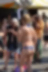 Hot ass Canadian babe in a bikini dancing at a concert