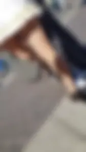 Girl in a Dress And Pantyhose Lifting Her Leg on the Street Creepshots Gallery