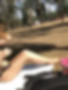 Ginger Girl in a Swimsuit Fixing Her Hair on a Lake Beach Creepshots - Great Legs
