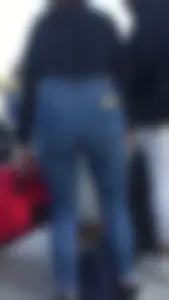 Teen in jeans pants bend over