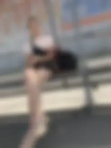 Bus Stop Girl Sitting with Crossed Legs Street Candid Photos