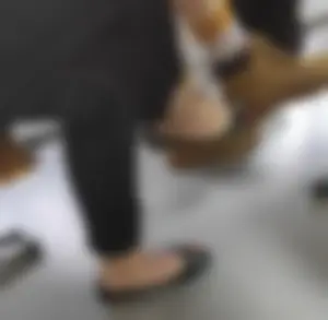 Teen College Student's Feet in Colorful Flats And Socks Closeups in Various Classrooms