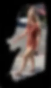 Summer blond in orange showing cheeks