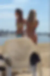 Blonde beach girl with a great ass in pink thong bikini