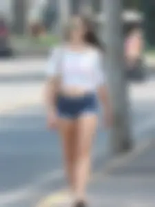 Denim short babe with a wedgie showing some cheeks