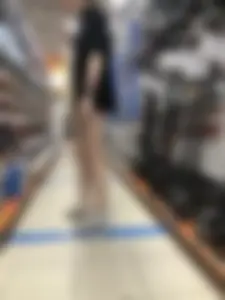 Tall Skinny Girl in Shorts and Sneakers With Long Thin Legs at a Store Creepshots Collection