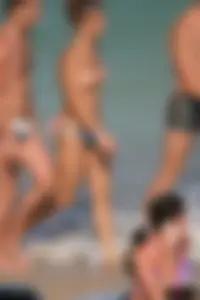 Beach voyeur girls in bikinis, thongs and topless