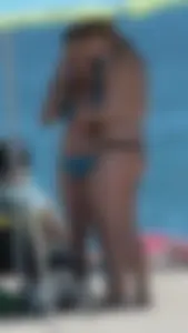 Bunch of sexy babes at the beach in bikinis