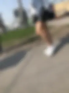 Awesome Candid Girl in a Leather Skirt And Sneakers Walking Down a Street, Then Flashing Her White Panties on the Stairs Creepshots Gallery