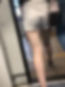 Subway train and subway station creepshots of a candid girl wearing shorts with pale skinny legs
