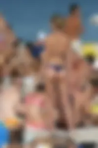 Beach voyeur girls in bikinis, thongs and topless