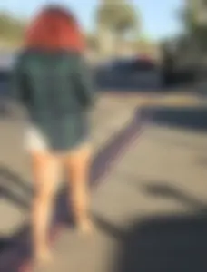 Big boobed redhead walking with no shoes and in shorts