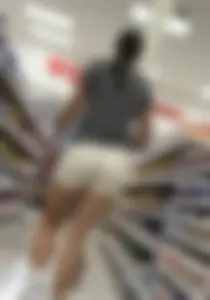 Amazing Asian in white yoga shorts upshot bends squat at Target