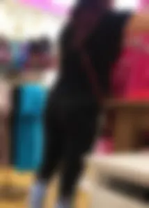 Mature sexy lady in Pink leggings shopping at Pink