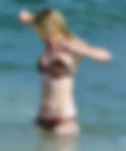 Cheetah print bikini blonde at the beach with nice body