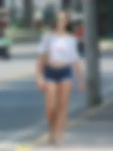 Denim short babe with a wedgie showing some cheeks