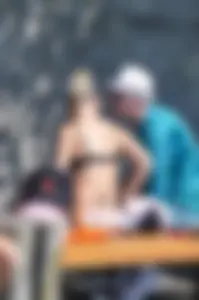 Blonde milf looking sexy in Hello Kitty bikini with nice mound and camel toe
