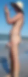 Cute girl on the beach with a decent body in thong bikini