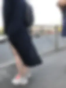Teen wearing black dress which becomes transparent