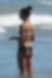Beach girl out in a bikini with a nice round big booty
