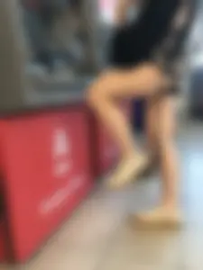 Candid Girl With Nice Skinny Legs in Shorts at the ATM Photos
