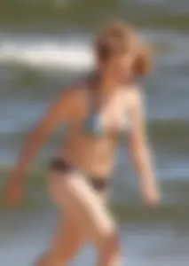 Two sexy beach teens in bikinis, one thick and one skinny with big boobs