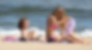 Two sexy beach teens in bikinis, one thick and one skinny with big boobs