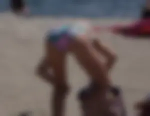2 cute beach girls in bikinis